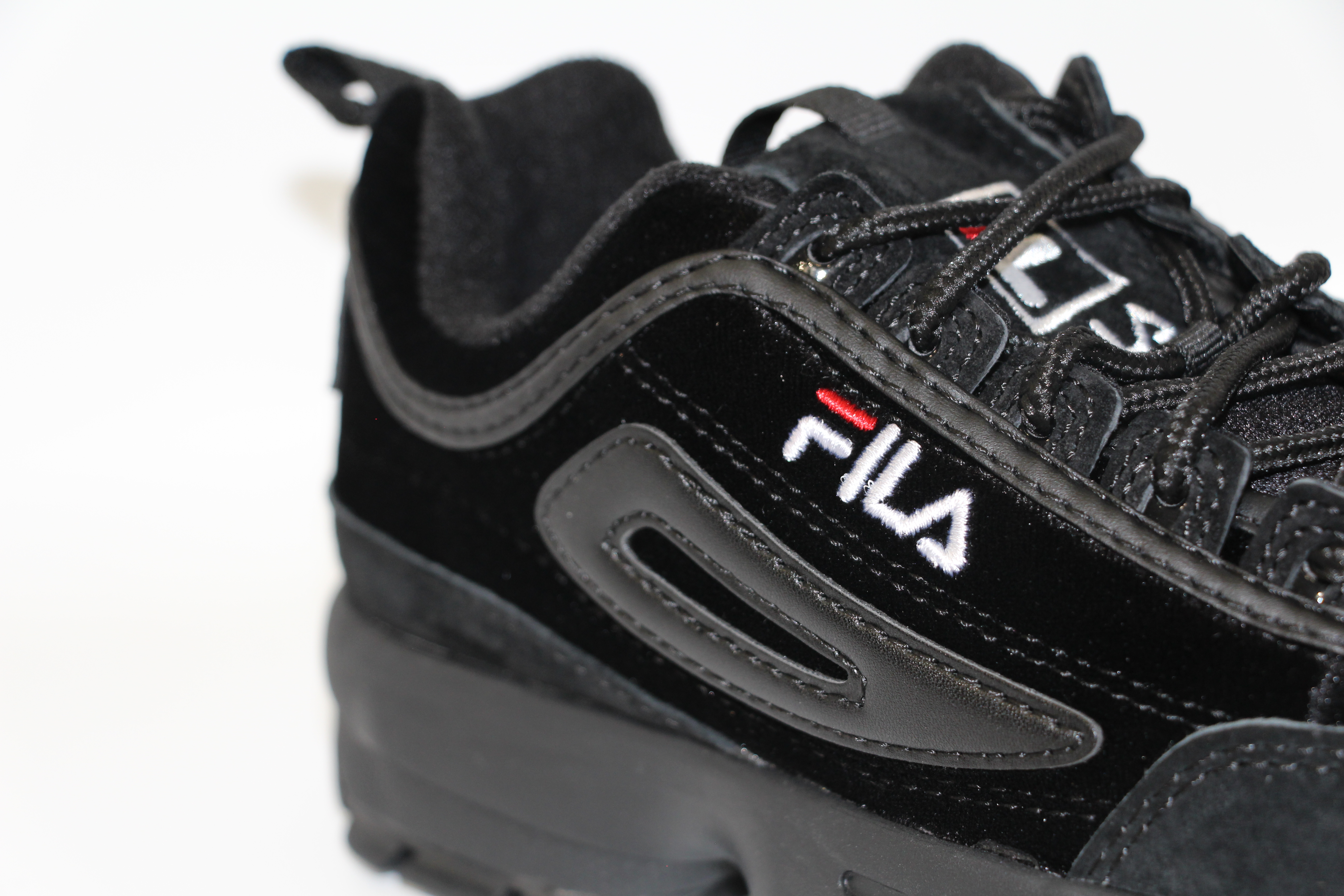 fila disruptor low wmn all black