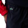 survetement LACOSTE SPORT color-block veste et pantalon en taffetas léger enfilable rouge magasin sport aventure à Orange sport et mode