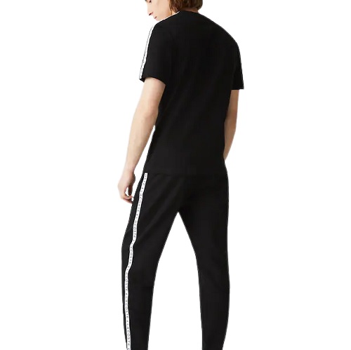 pantalon de jogging Lacoste sport color block noir à bandes côté sport aventure Orange