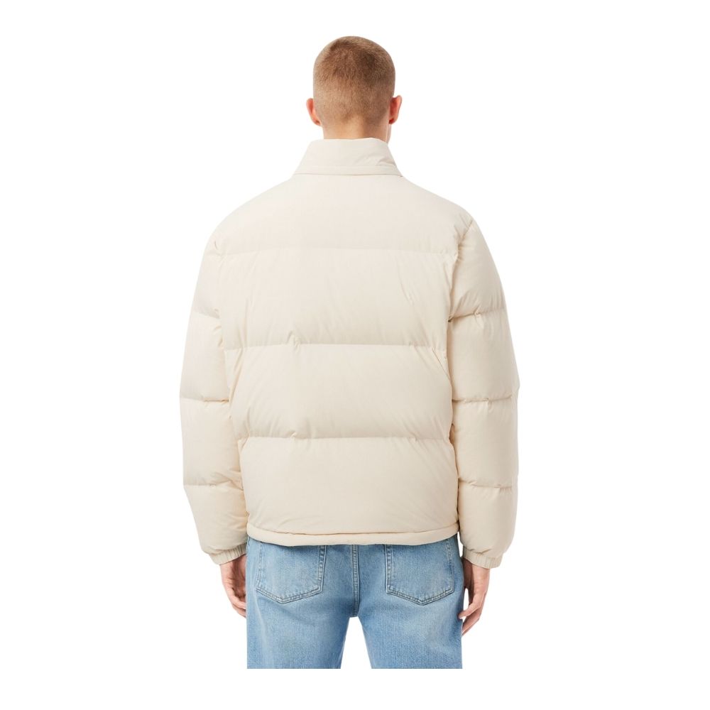 doudoune en duvet lacoste écru chez sport aventure à Orange