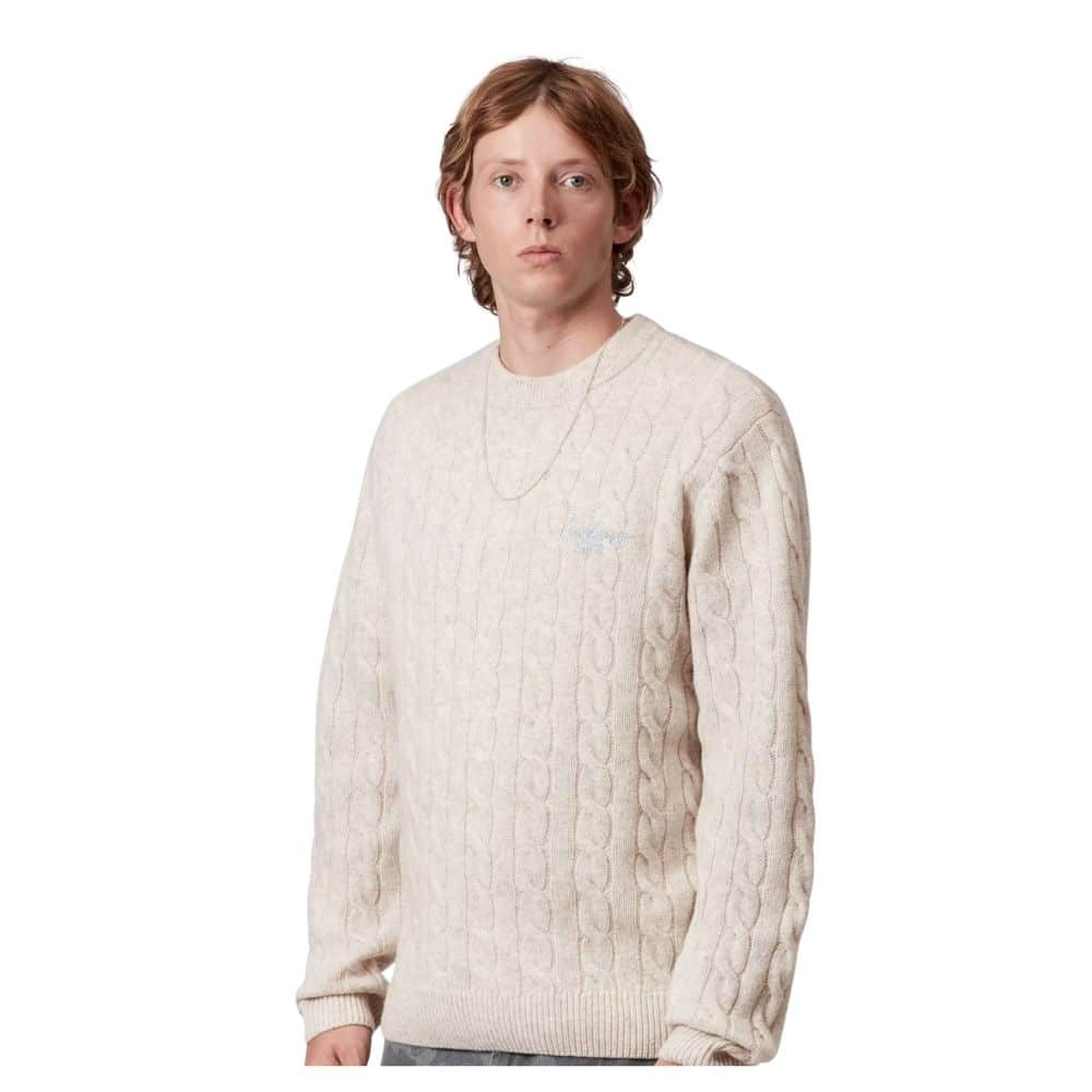 pull carhartt signature écru a torsade chez sport aventure à Orange