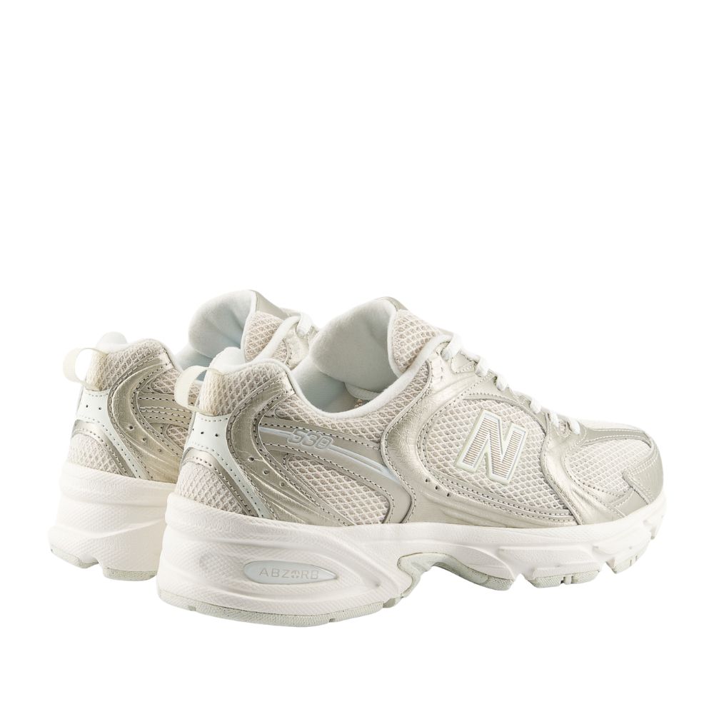 chaussures New Balance femme 530 doré gold chez sport aventure à Orange