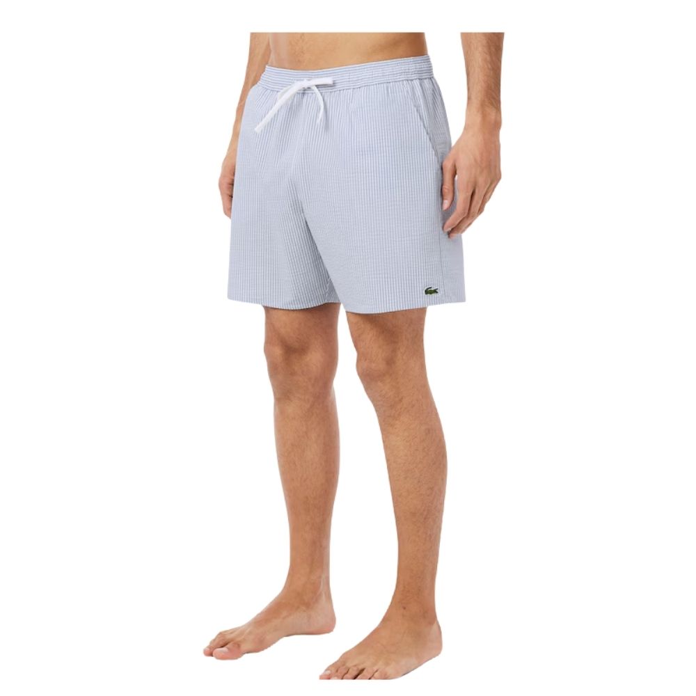 lacoste short de bain rayé bleu ciel chez sport aventure à Orange