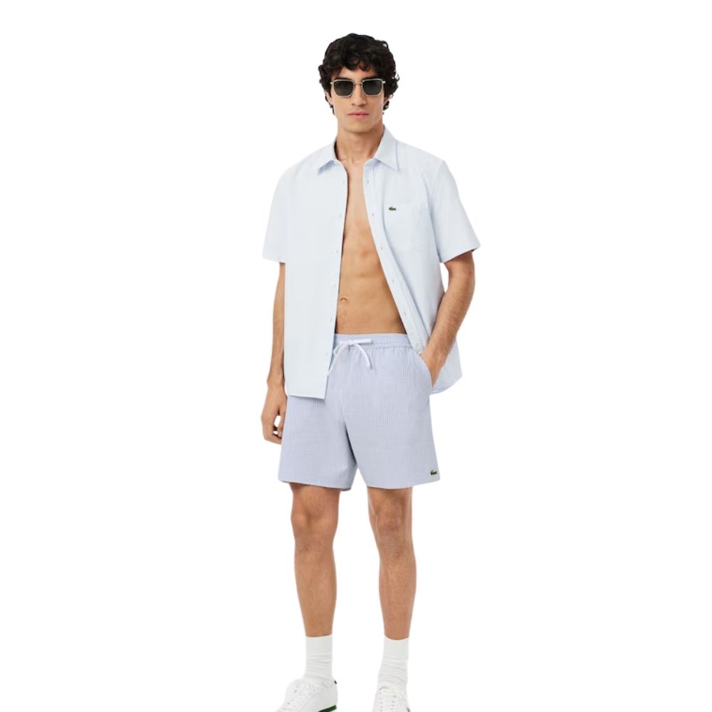 lacoste short de bain rayé bleu ciel chez sport aventure à Orange