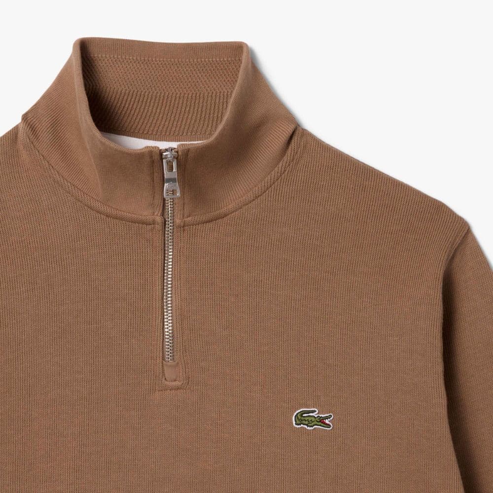 LACOSTE sweat demi-zip interlock oxalis bordeauxcamel cookie chez sport aventure à Orange