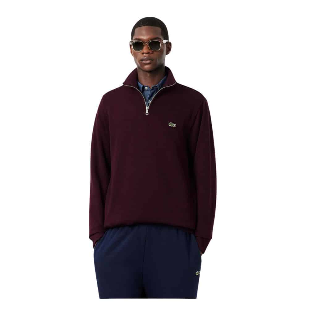 LACOSTE sweat demi-zip interlock oxalis bordeaux chez sport aventure à Orange