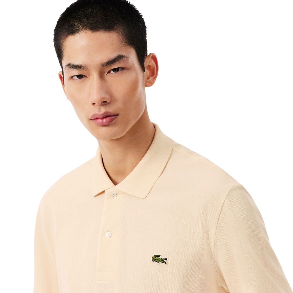 lacoste polo manches longues écru chez sport aventure à Orange
